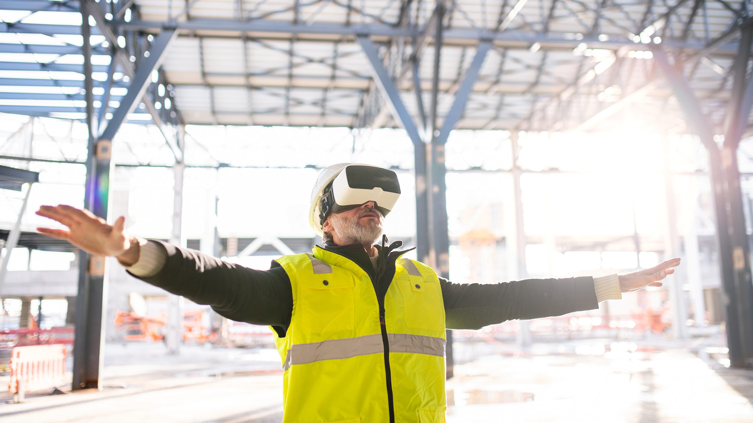 Man using a VR headset in a construction site